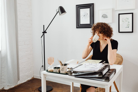 A woman drinking coffee